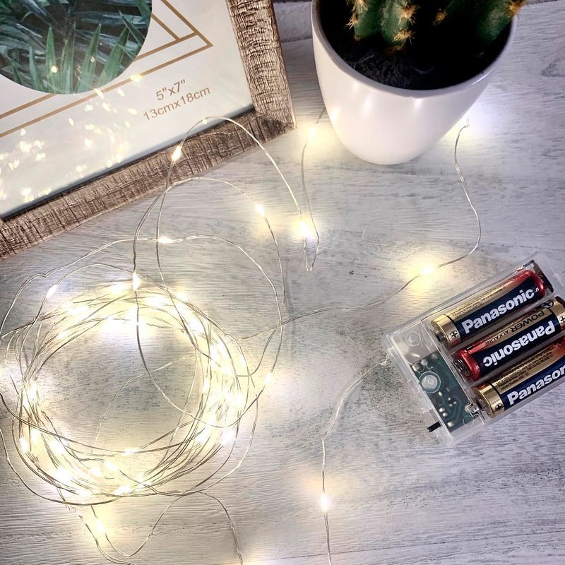 Juego-de-20-luces-navideñas-LED-de-luz-amarilla-con-cable-blanco.