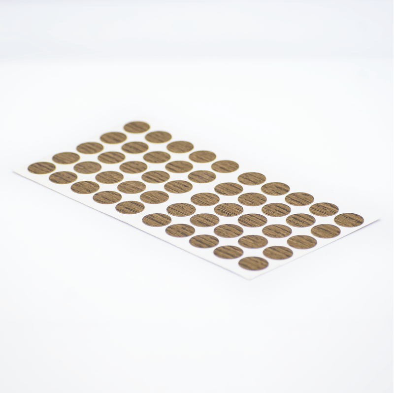 Tapa-Adhesiva-Bellota-diseñada-para-cubrir-y-disimular-los-orificios-o-cabezas-de-tornillos-en-tableros-de-madera