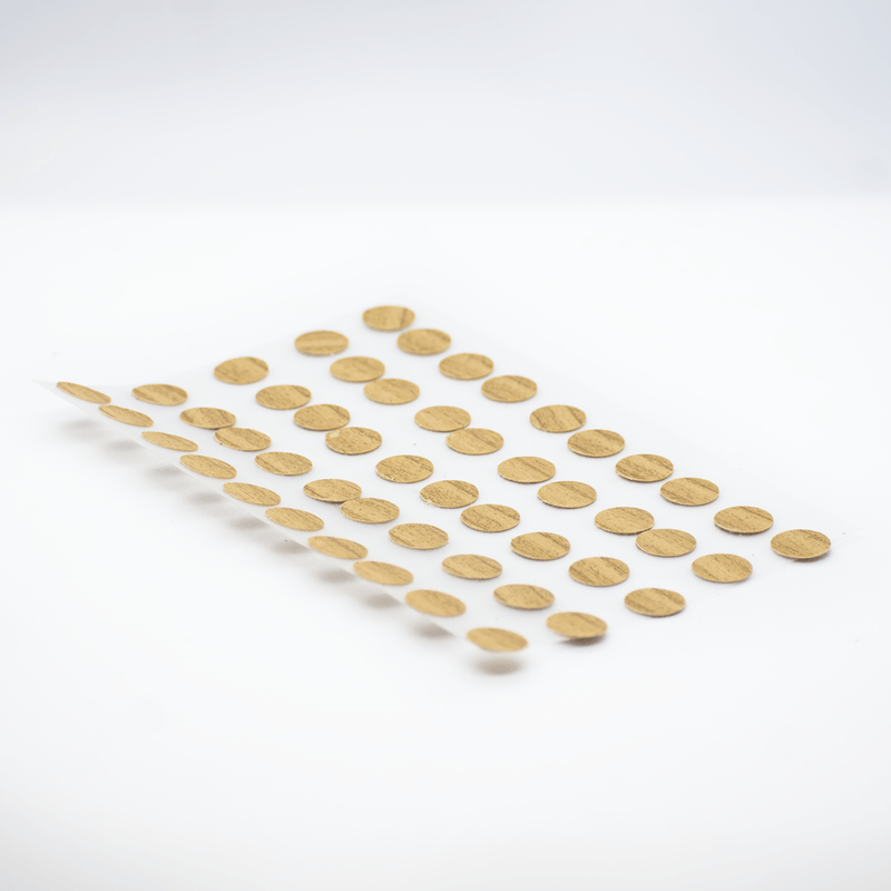Tapa-Adhesiva-Panela-diseñada-para-cubrir-y-disimular-los-orificios-o-cabezas-de-tornillos-en-tableros-de-madera