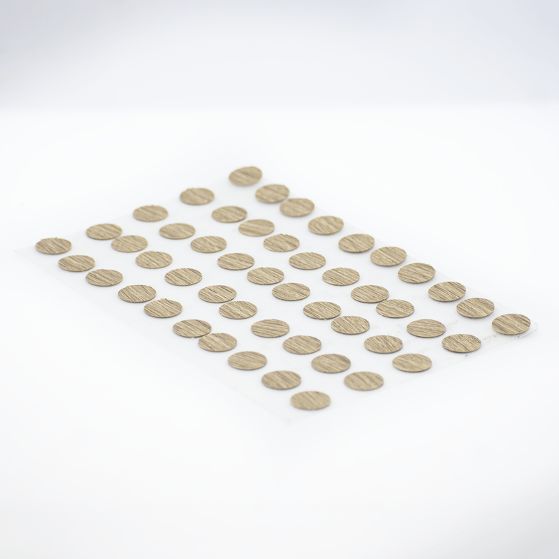 Tapa-Adhesiva-Bardolino-diseñada-para-cubrir-y-disimular-los-orificios-o-cabezas-de-tornillos-en-tableros-de-madera