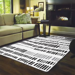 Alfombra de área gris con patron de LINEAS negras y blancas, de 120 x 170 cm. - KENNEDY CARPETS