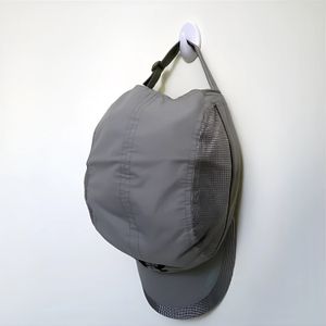 Gancho adhesivo plástico color blanco con 1 kg de capacidad de carga, Set x 4 unidades. - K HOME