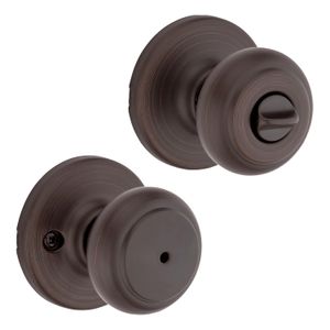 Cerradura para baño o dormitorio BRONCE VENECIANO COVE con tecnología antibacterial. - KWIKSET